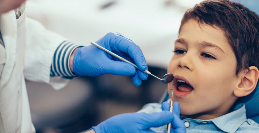 kid at the dentist